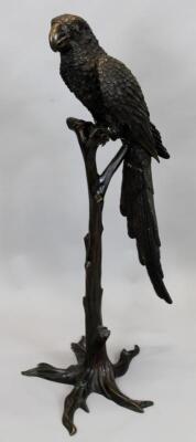 A large bronze model of a parrot