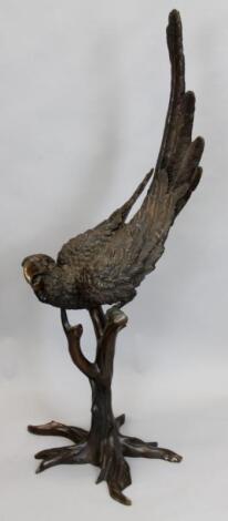 A large bronze model of a parrot