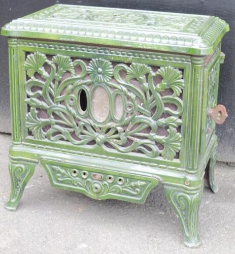 A 1920's Art Nouveau green enamel cast iron Scott stove