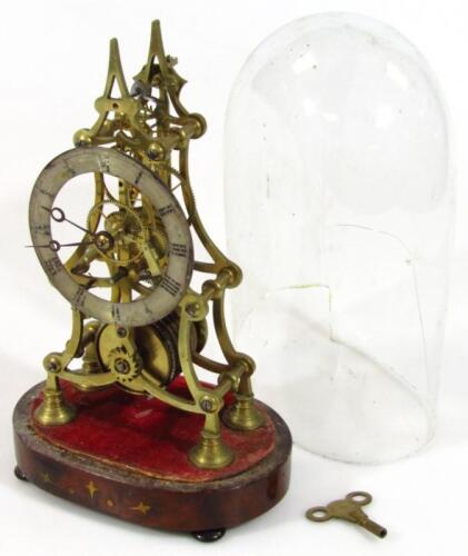 A brass skeleton clock