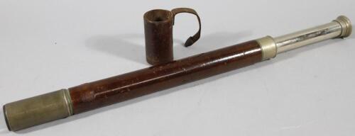 An early 20thC Royal Navy leather bound telescope