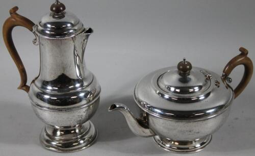 A George V silver two piece part tea service