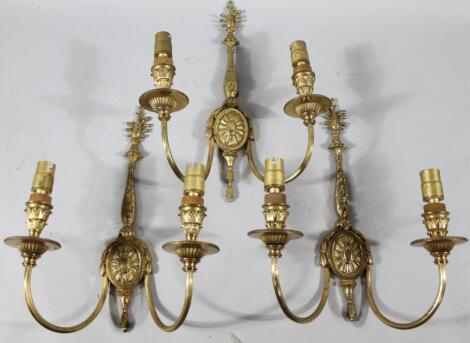 A pair of 20thC rococo design brass wall scones