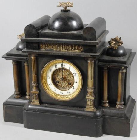 A Victorian polished slate and glazed mantel clock