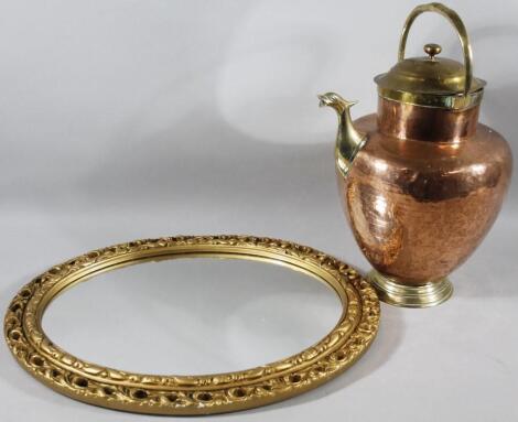 An early 20thC brass and copper flagon