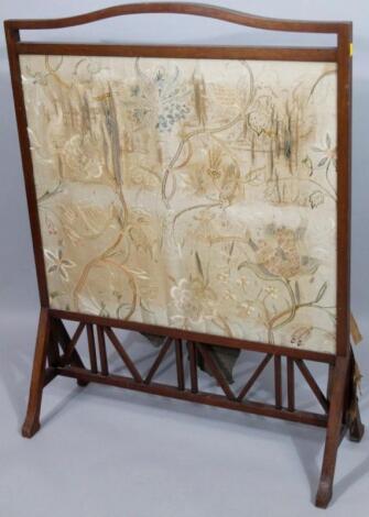 An early 20thC fire screen