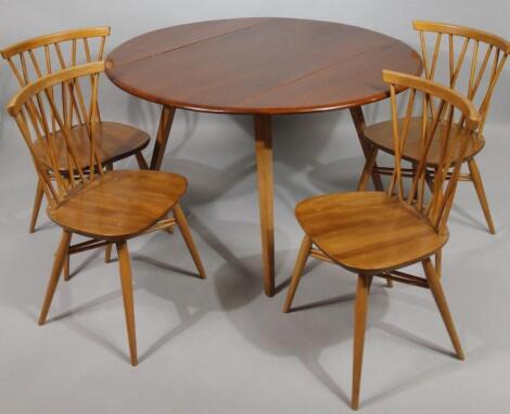 A 1950's retro Ercol dining room suite