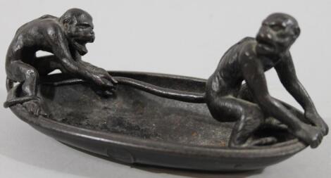 A Russian iron monkey boat dish