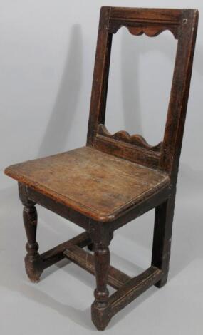 An 18thC French oak nursing chair