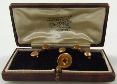 A set of 9ct gold collar studs