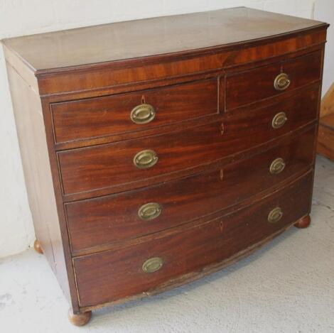 An early 19thC mahogany bow front chest