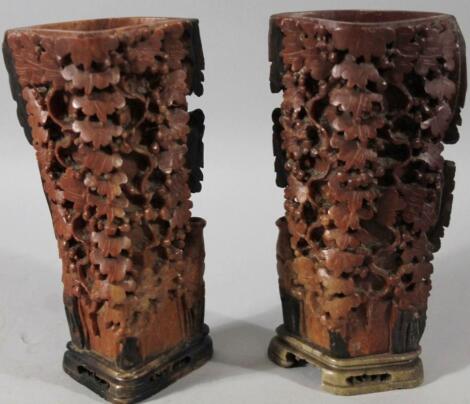 A near matching pair of 20thC carved Chinese soapstone vases