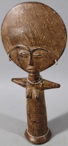 A 20thC carved tribal figure