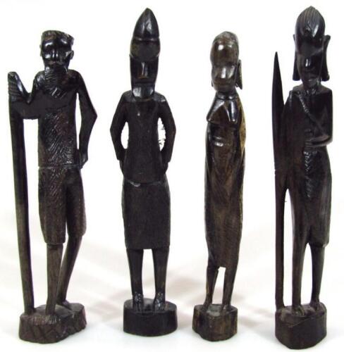 Four various carved wooden ebonised African tribal figures