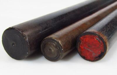 A cylindrical ebonised stick - 2