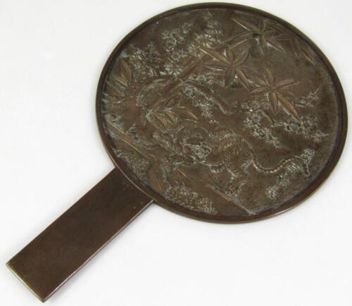 A Chinese late Qing period brass face screen mirror