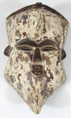 Four various carved African tribal hardwood face masks - 2