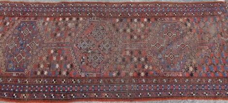 A late 19thC Persian carpet runner