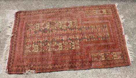 An early 20thC woollen rug