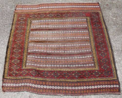 A 20thC woollen rug