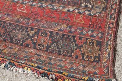 A Middle Eastern woollen rug - 2