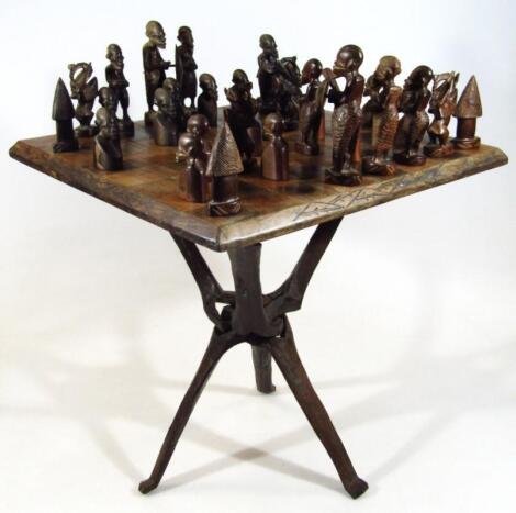 An African hardwood tribal style chess board