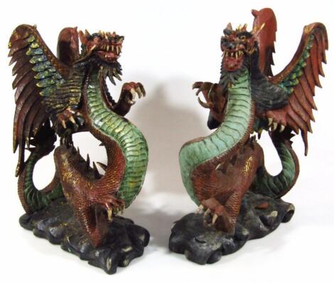 A pair of painted temple dragons