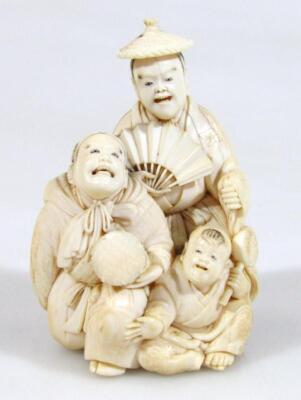 A 19thC Japanese Meiji period ivory figure group