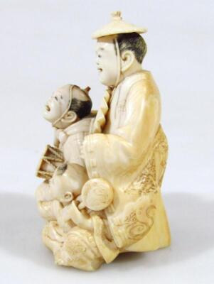 A 19thC Japanese Meiji period ivory figure group - 2