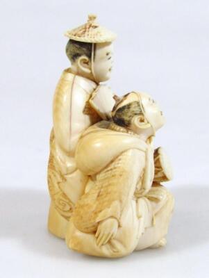 A 19thC Japanese Meiji period ivory figure group - 4