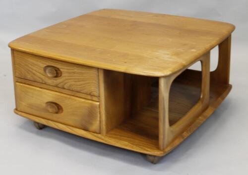 An Ercol retro style light elm square coffee table