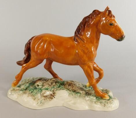 A Beswick model of a bay coloured horse