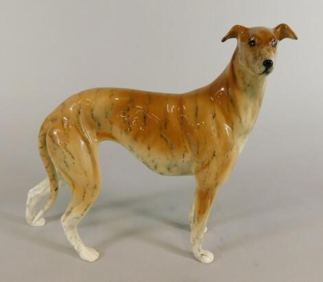 A porcelain model of a brindle coloured greyhound