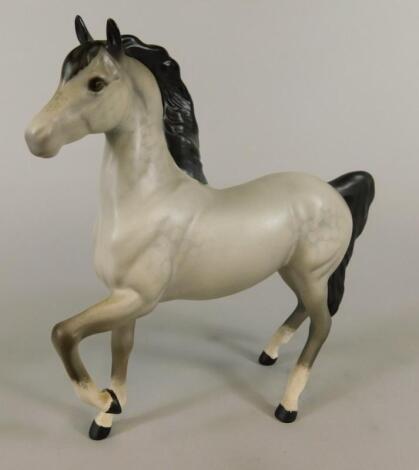A matt glazed Beswick porcelain grey horse