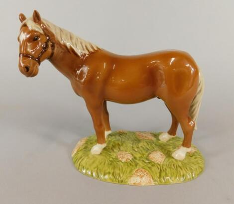 A Royal Doulton porcelain model My First Pony