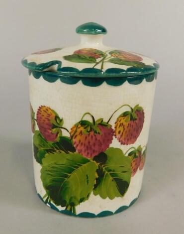 A Wemyss pottery jar and cover