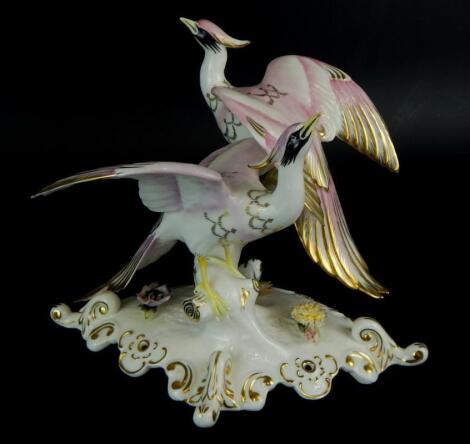 A Royal Crown Derby of two birds on branch with flowers