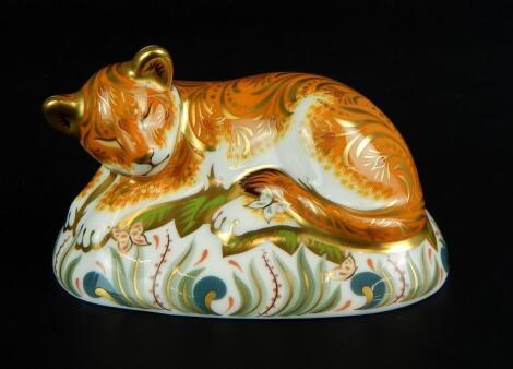 A Royal Crown Derby sleepy lion cub paperweight