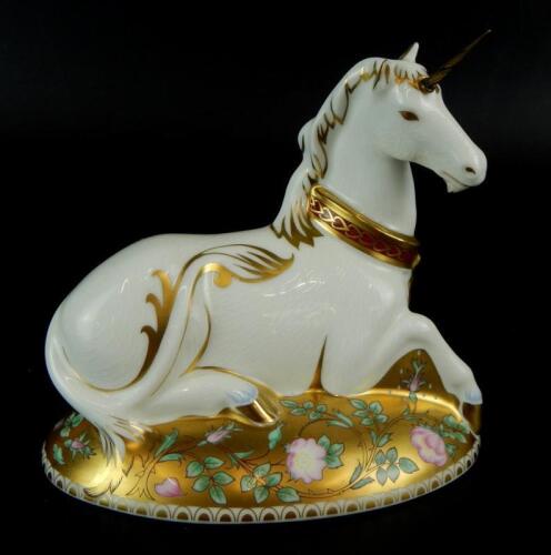 A Royal Crown Derby mythical unicorn paperweight