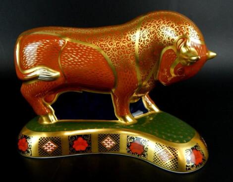 A Royal Crown Derby Harrods bull paperweight