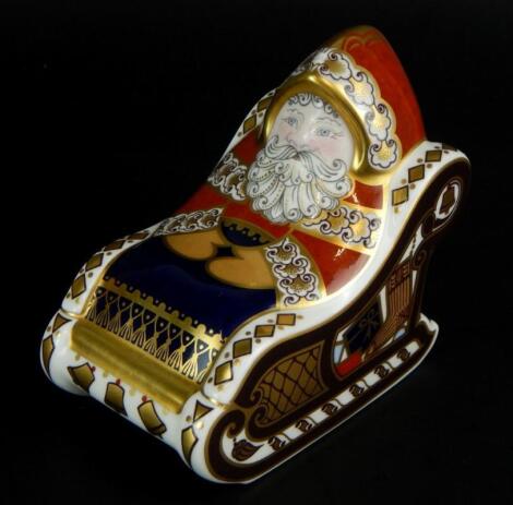 A Royal Crown Derby Santa and Sleigh paperweight