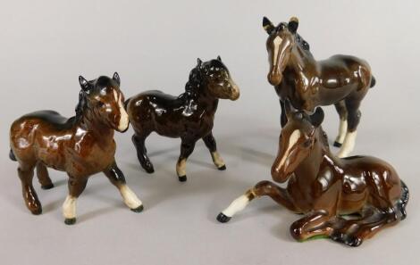 Four Beswick small horse ornaments