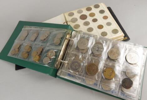 Two albums containing a collections of British & foreign coins