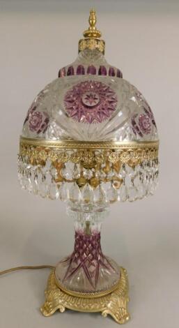 An amethyst flashed cut glass table lamp