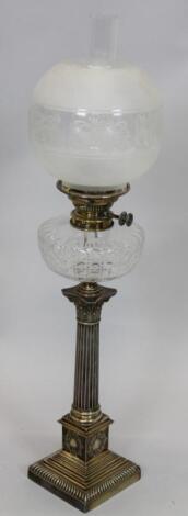 A 19thC silver plated Corinthian column oil lamp