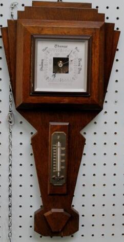 An aneroid barometer and thermometer