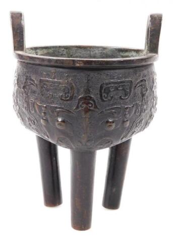 An Archaistic Archaic style Chinese bronze Li-Ting three footed wine vessel