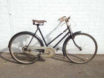 A vintage gents bicycle with Hercules seat.