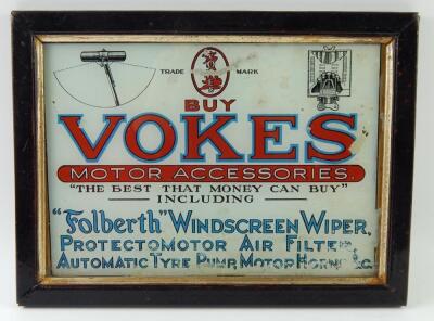 A 1950's Vokes Motor Accessories advertising glass panel