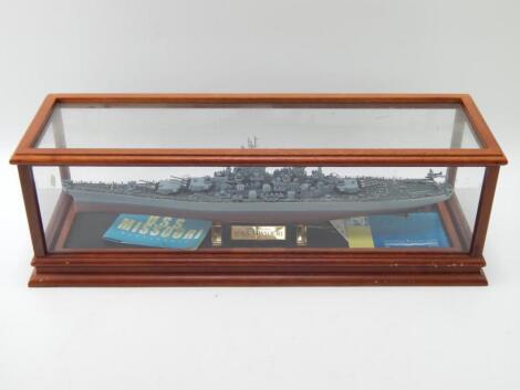 A Franklin Mint scale model of the USS Missouri battleship